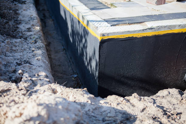 Professional Basement Waterproofing technician working in Bloomfield Hills, MI